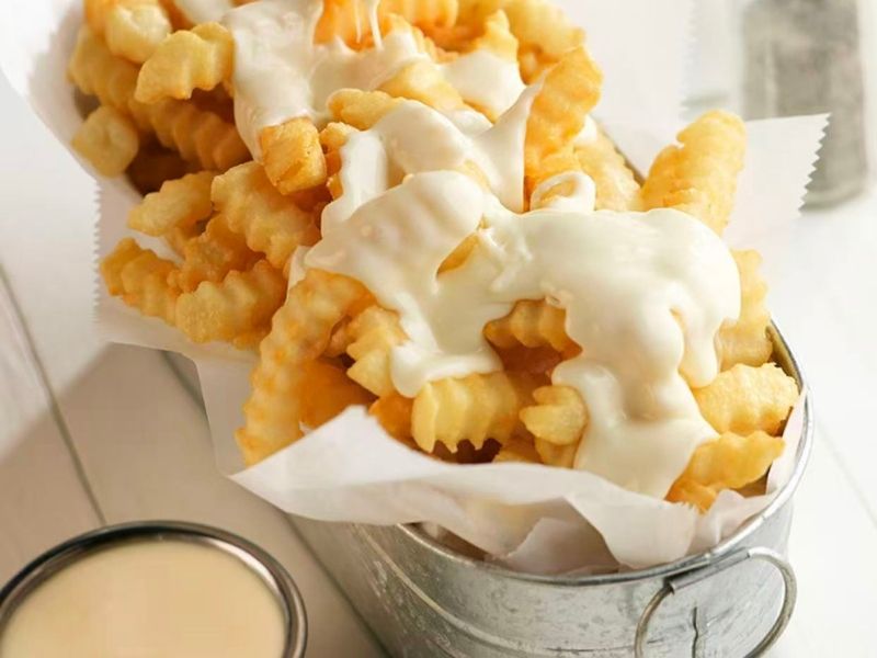 Wing-Side-Cleveland-Fast-Food-Restaurant-Cheese-Fries-Cleveland Crinkle fries topped with melted cheese at Wing Side - Cleveland, a Fast Food Restaurant in Cleveland