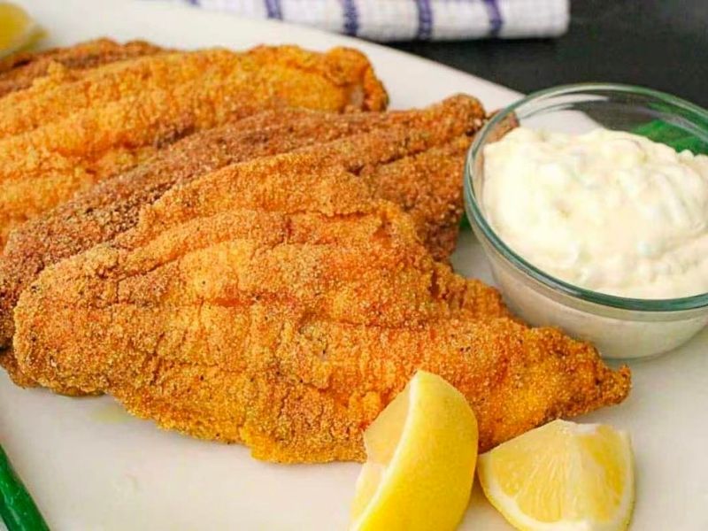 Wing-Side-Cleveland-Fast-Food-Restaurant-Fried-Fish-Cleveland Crispy fried fish fillets, served with tartar sauce, lemon at Wing Side - Cleveland, a Fast Food Restaurant in Cleveland