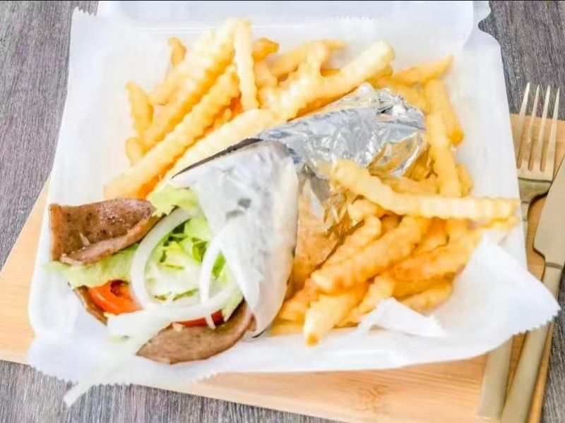Wing-Side-Cleveland-Fast-Food-Restaurant-Gyro-and-Fries-Cleveland Gyro wrap with veggies, served with fries at Wing Side - Cleveland, a Fast Food Restaurant in Cleveland