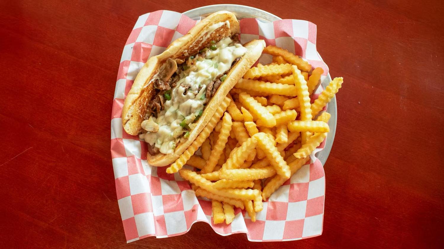 Sandwich with fries from Wings Way, a chicken wing restaurant in Hollywood