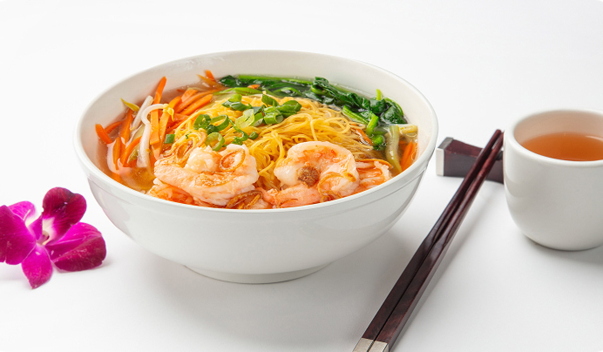 Shrimp noodle soup with vegetables and tea at Wok 88, a Chinese Restaurant in New York