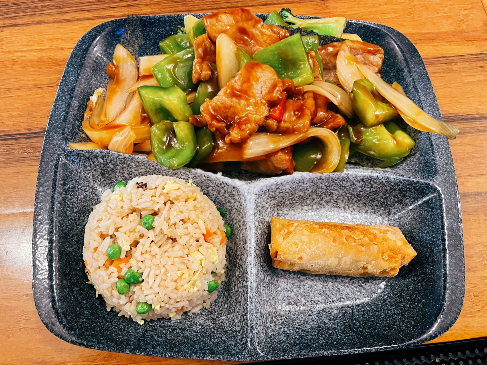 Pepper steak with onion lunch special with fried rice and egg roll at Wukong Asian Restaurant in Hilldale