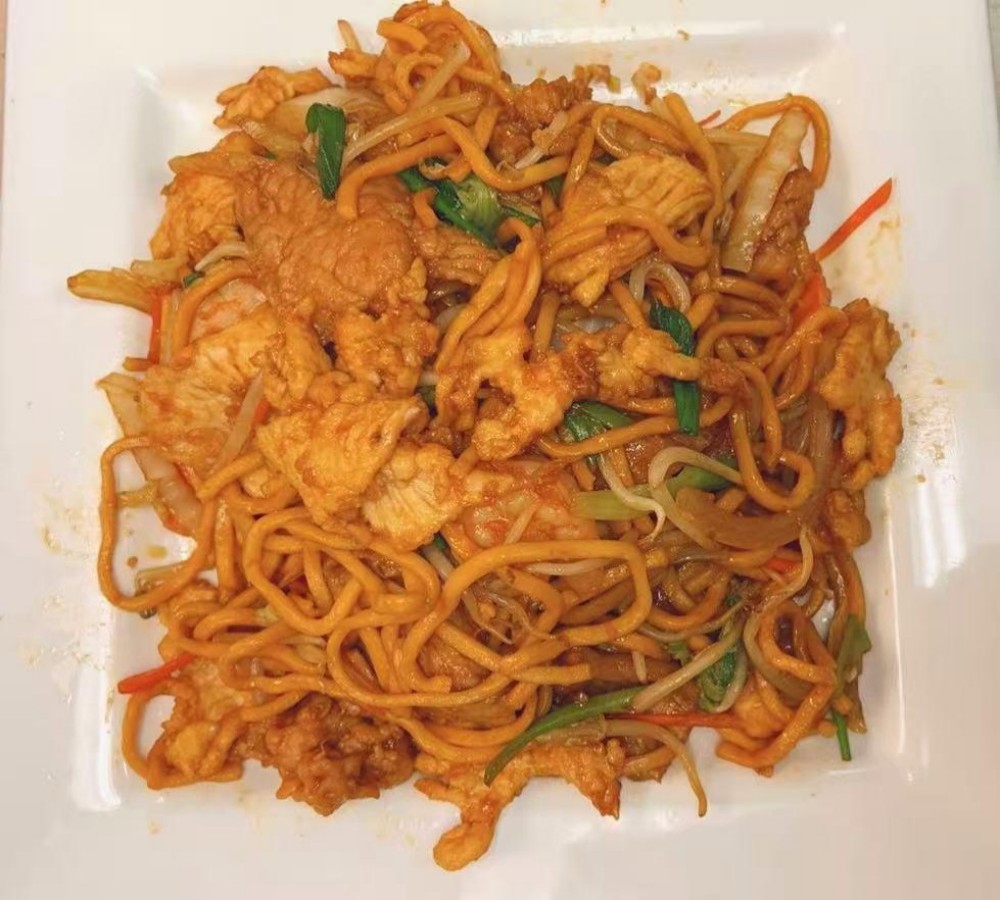 Stir-fried noodles with pork and vegetables at Wukong Asian Restaurant, a Asian Restaurant in Omaha.