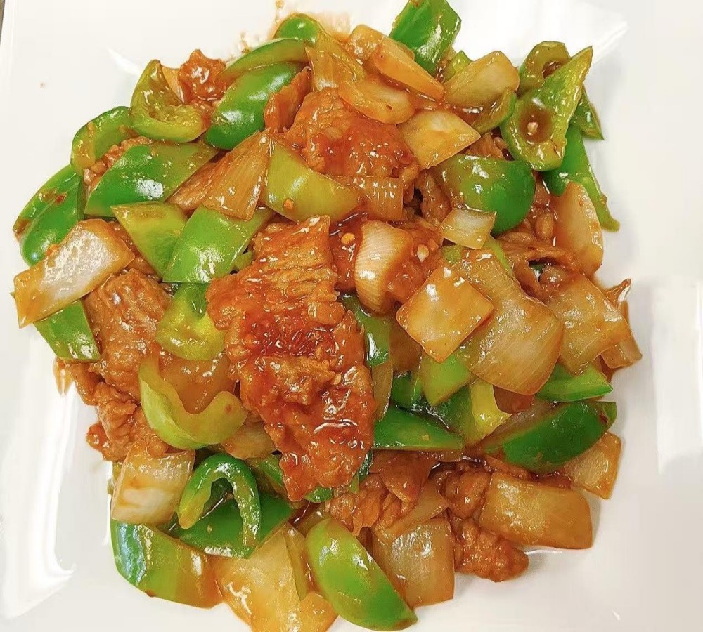 Stir-fried pork with green peppers and onions at Wukong Asian Restaurant, a Asian Restaurant in Omaha.