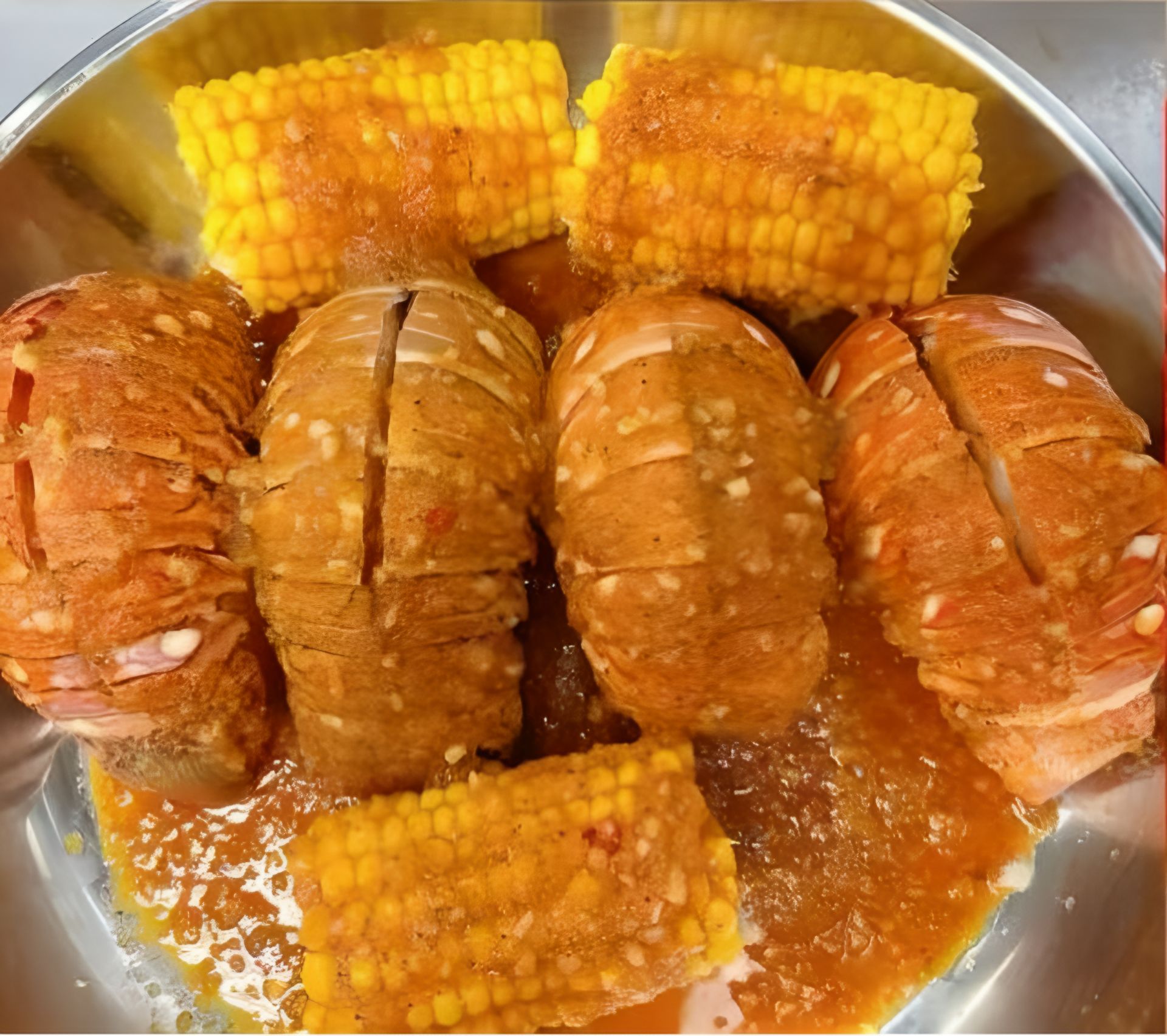 Wu’s-Crab-Seafood-Restaurant-Lobster-and-Corn-Stew-Layton Lobster and corn stew with a flavorful sauce at Wu's Crab, a Seafood Restaurant in Layton