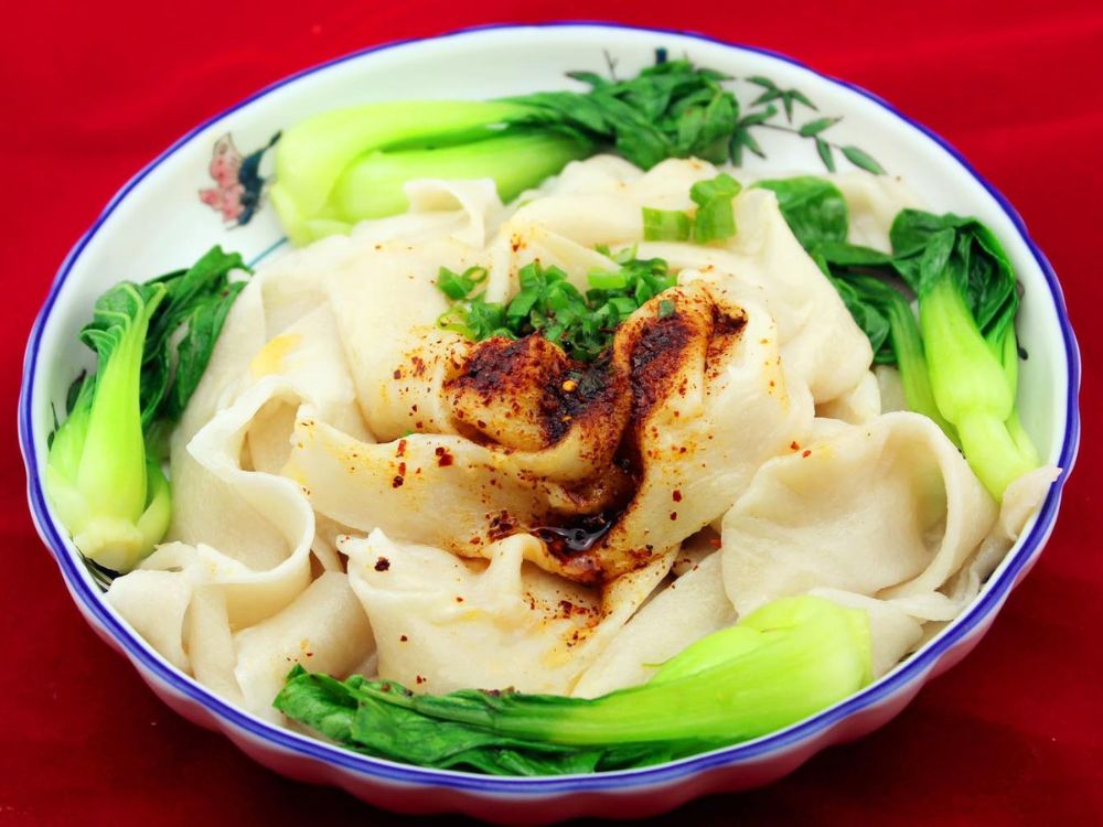 Xi’an-Sizzling-Woks-Chinese-Restaurant-Oil-Splashed-Noodles-Philadelphia Broad noodles with chili oil, green onions and bok choy at Xi'an Sizzling Woks, a Chinese Restaurant in Philadelphia