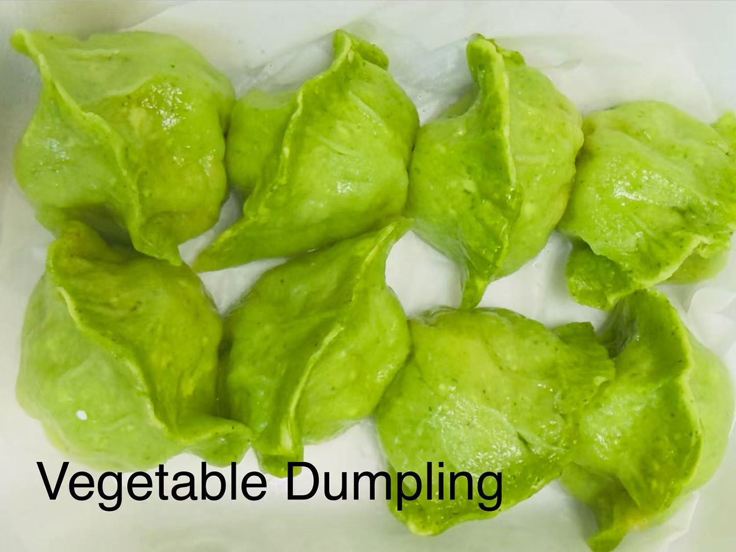 Fresh veggie dumplings with spinach wrapper at Xiao Ling's Noodles & Dumplings, a Chinese Restaurant in The Colony