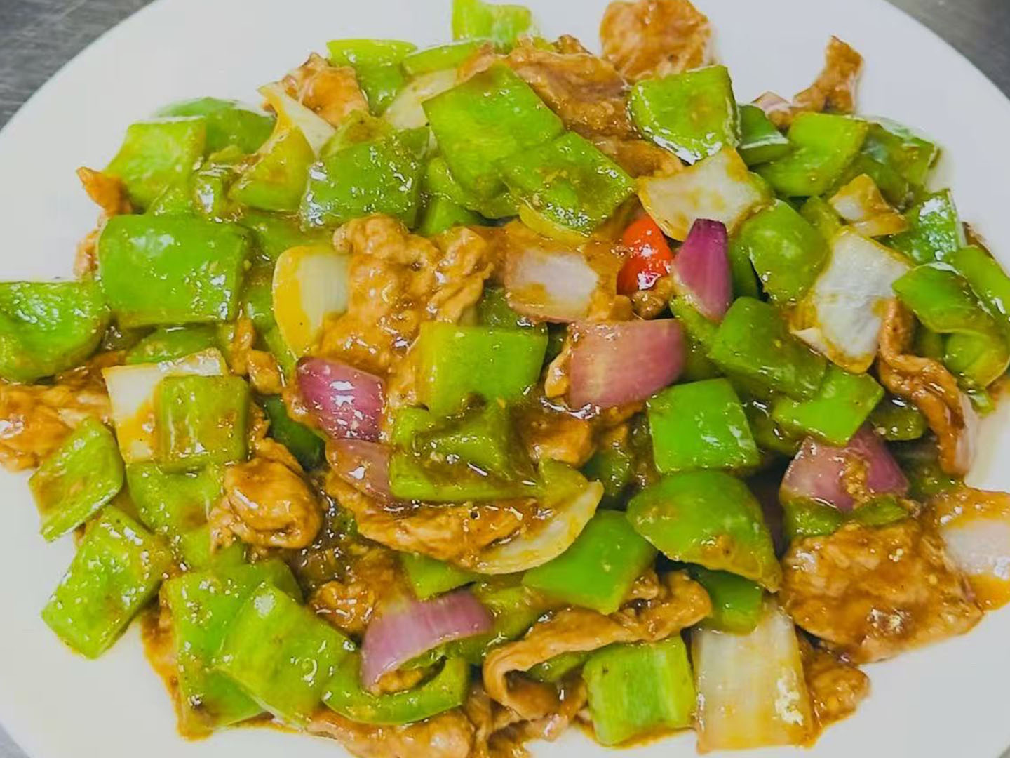 Savory shredded pork stir-fried with bell peppers at Xiao Ling's Noodles & Dumplings, a Chinese Restaurant in The Colony