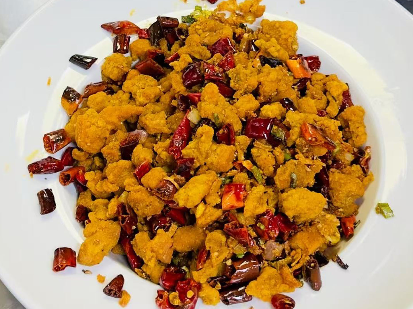 Spicy dry-fried fish roe with Sichuan chili at Xiao Ling's Noodles & Dumplings, a Chinese Restaurant in The Colony