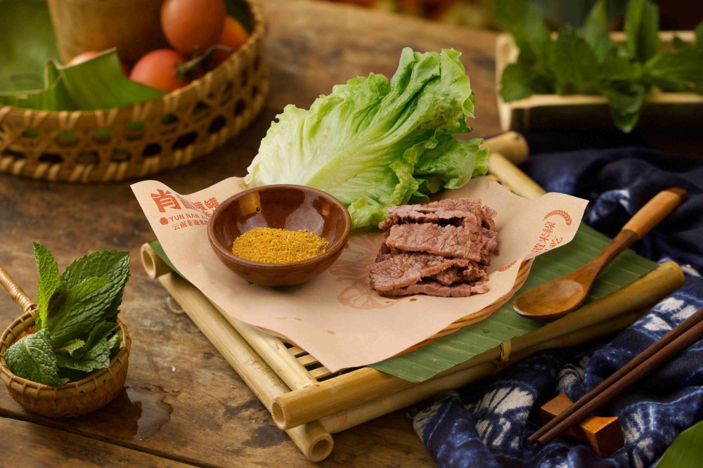 Freshly roasted beef slices served with spicy dipping powder at Xiaozhan Rice Noodle, a Chinese Noodle Restaurant in Flushing