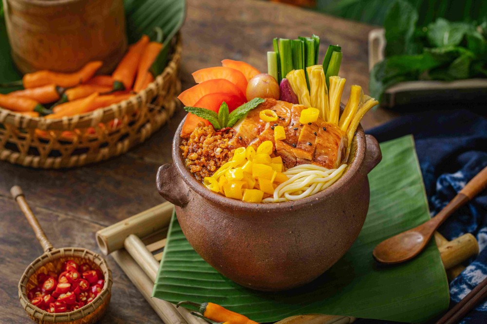 Roasted duck pot rice noodles with pickled veggies at Xiaozhan Rice Noodle, a Chinese Noodle Restaurant in Flushing