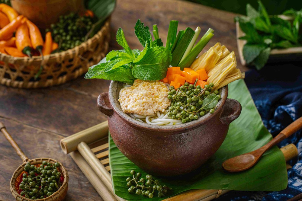 Sichuan pepper fresh pork pot rice noodles with mint at Xiaozhan Rice Noodle, a Chinese Noodle Restaurant in Flushing