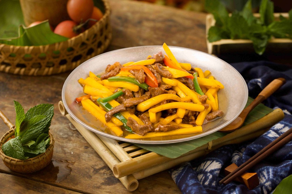 Stir-fried beef with mango and bell peppers at Xiaozhan Rice Noodle, a Chinese Noodle Restaurant in Flushing