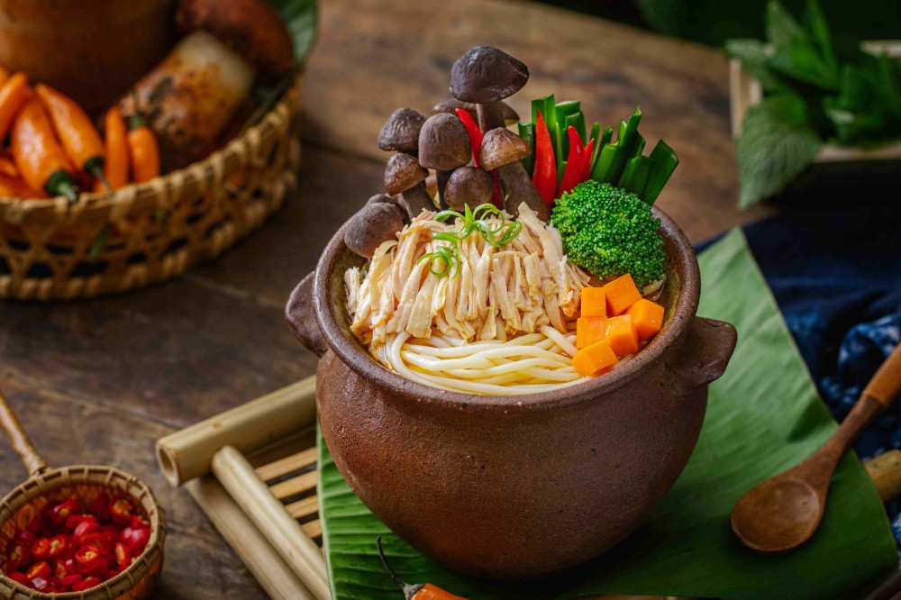 Three kinds mushroom pot rice noodles with shredded chicken at Xiaozhan Rice Noodle, a Chinese Noodle Restaurant in Flushing