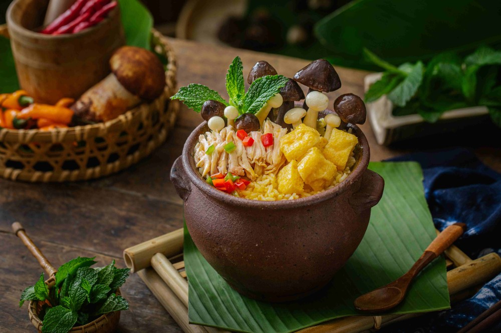 Three kinds mushroom soup pot rice with chicken and tofu at Xiaozhan Rice Noodle, a Chinese Noodle Restaurant in Flushing