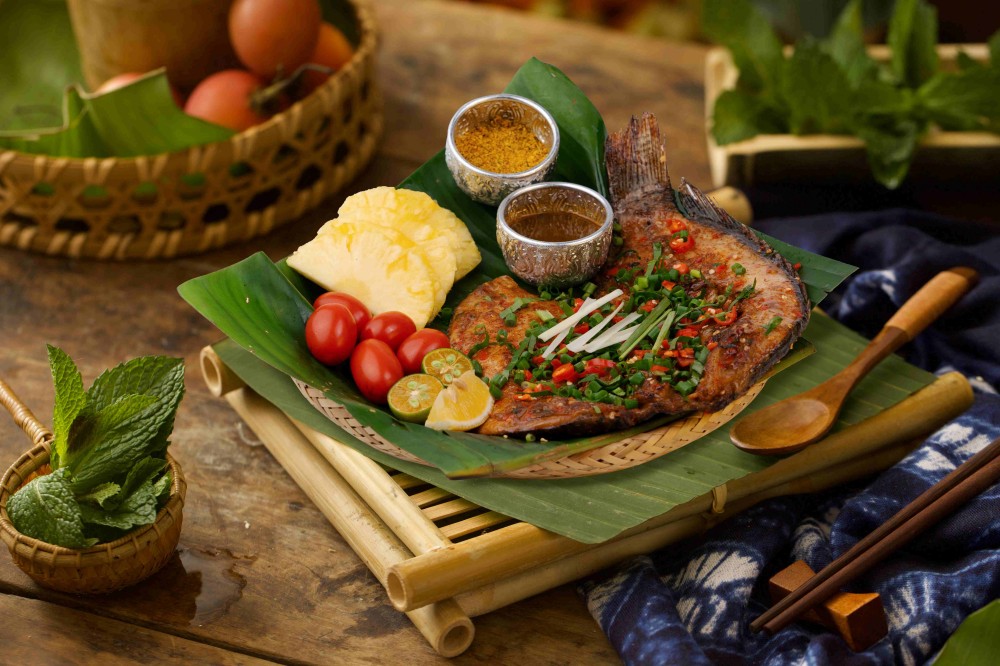 Tin foil freshly roasted fish with spicy herbs at Xiaozhan Rice Noodle, a Chinese Noodle Restaurant in Flushing