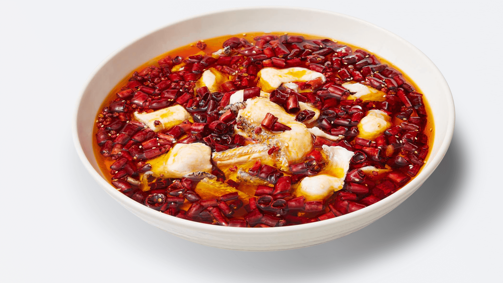 Fish poached in Szechuan chili oil with chili peppers at XIBEI, a Chinese Restaurant in Arcadia