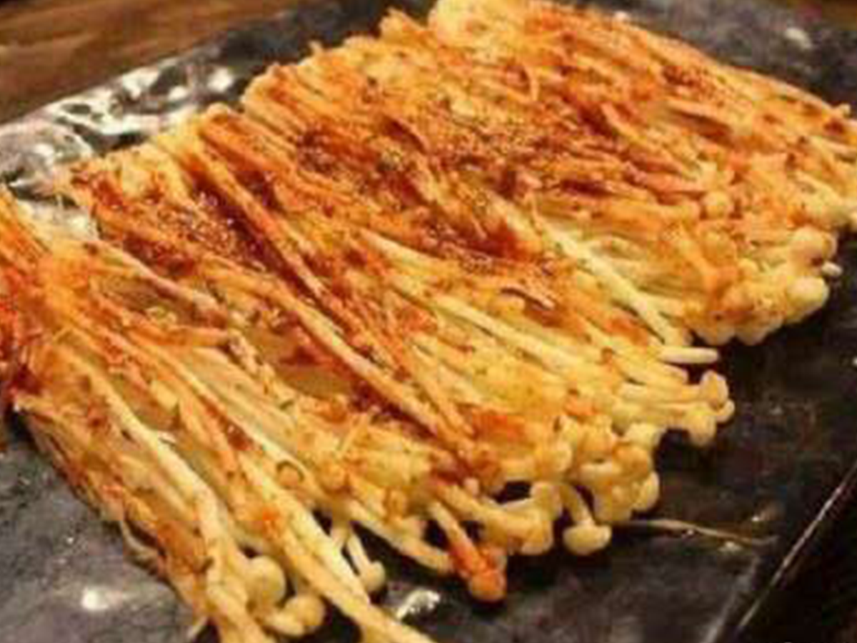 Seasoned grilled enoki mushrooms at Xin Jiang BBQ, a Chinese Restaurant in Houston