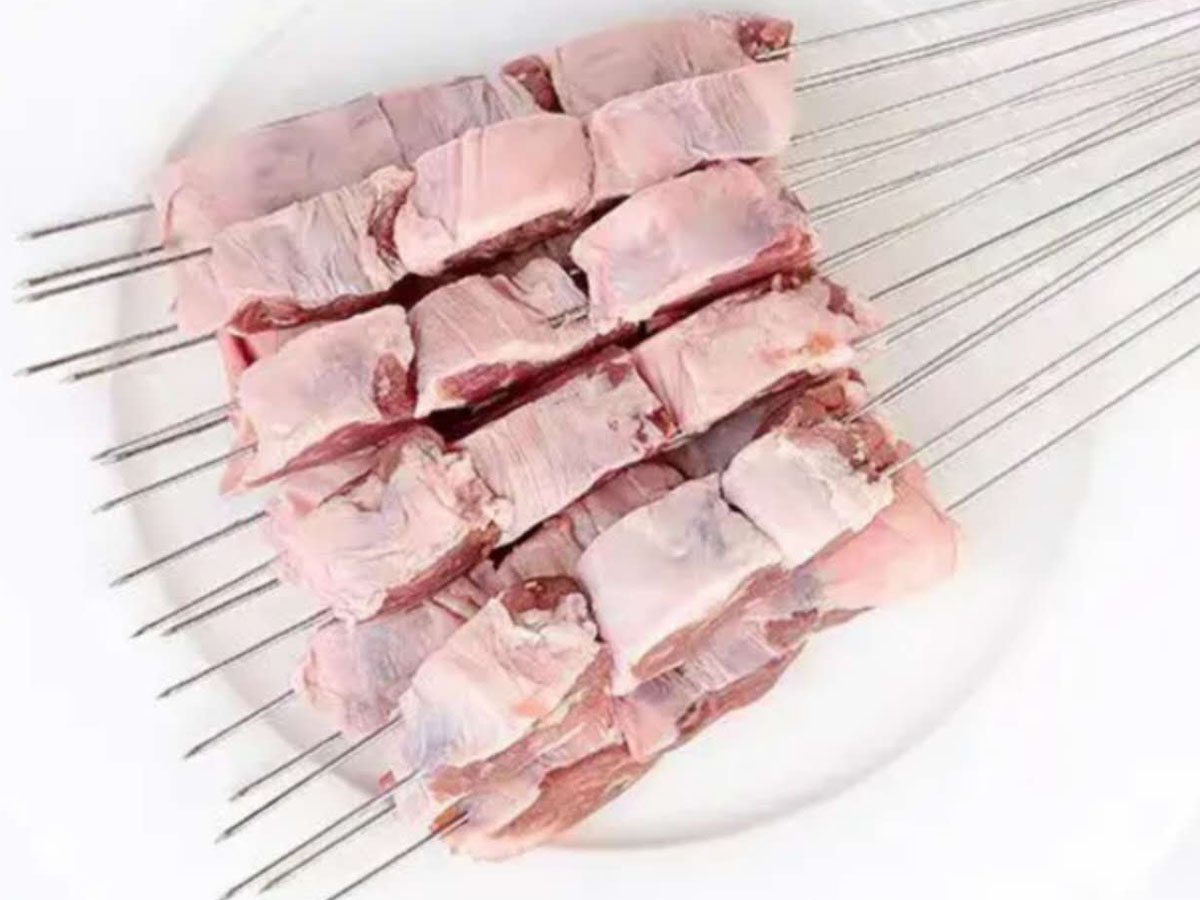 Raw marinated meat skewers at Xin Jiang BBQ, a Chinese Restaurant in Houston