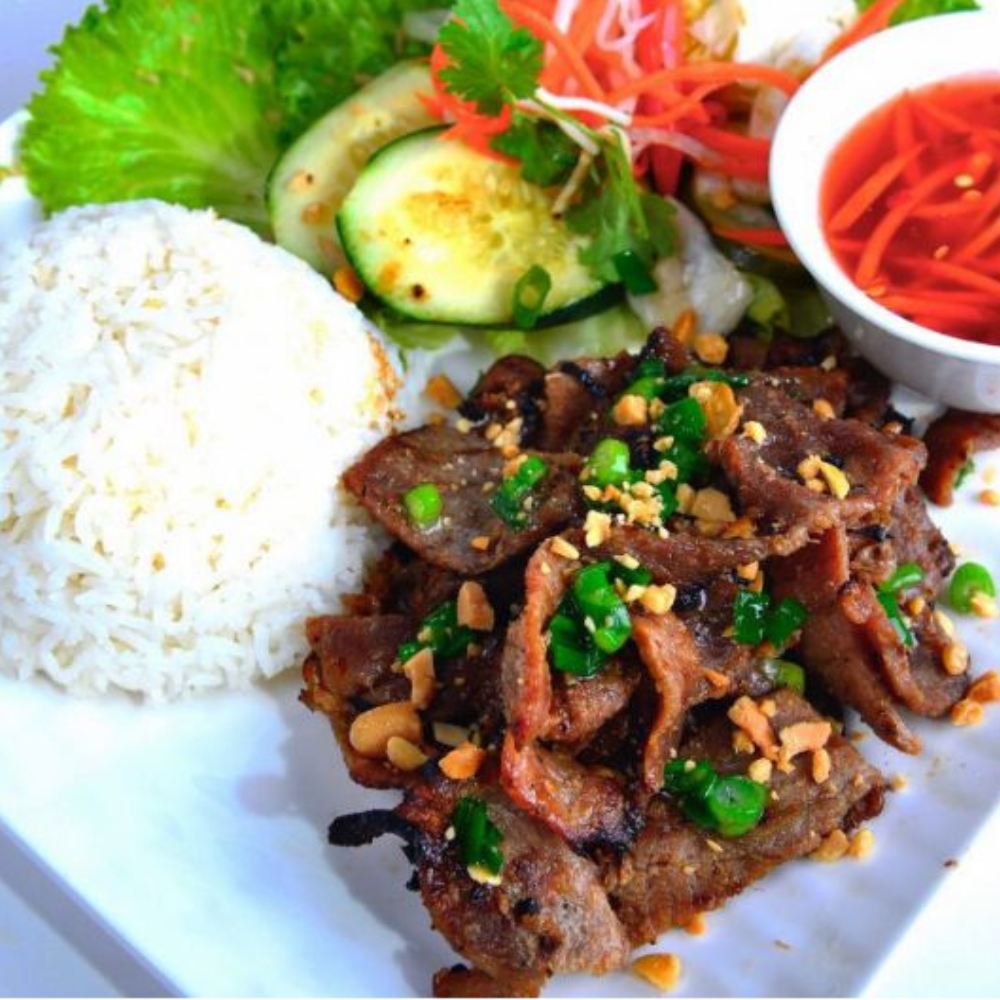 Grilled pork with peanuts served with rice and veggies at Yangtze Chinese Restaurant, a Chinese Restaurant in Chardon.