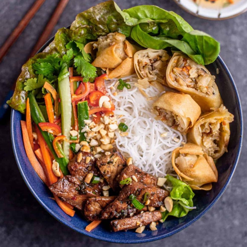 Vermicelli bowl with spring rolls and grilled meat at Yangtze Chinese Restaurant, a Chinese Restaurant in Chardon.