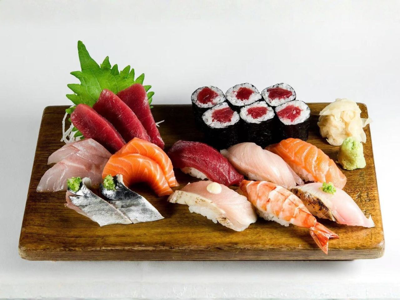 Traditional sushi and sashimi set on a wooden board at Yantze, a Asian Fusion Restaurant in Lansdale