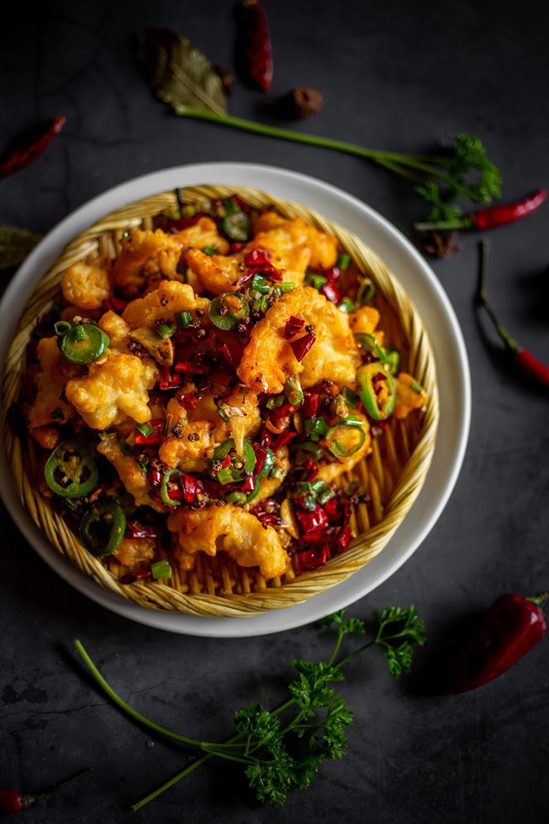 Crispy fried fish fillets with chili peppers and green onions at Ya Ya, a Chinese Restaurant in Houston