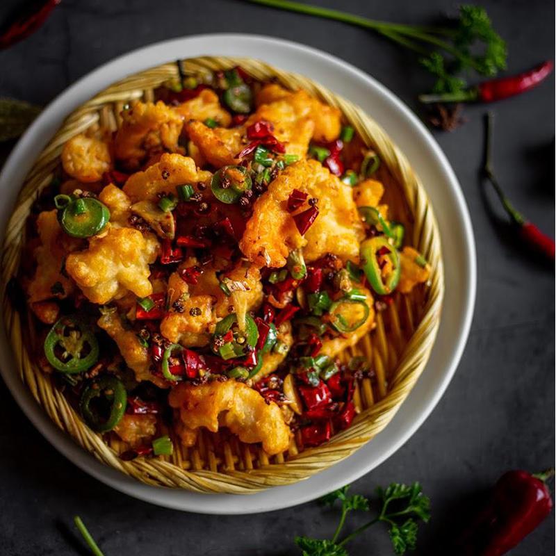 Crispy fried fish fillets with chili peppers and green onions at Ya Ya, a Chinese Restaurant in Houston