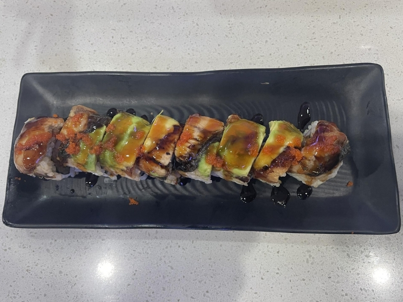 Dragon roll sushi with eel, avocado, and tobiko at YC Seafood Hot Pot, a Hot Pot Restaurant in Virginia Beach