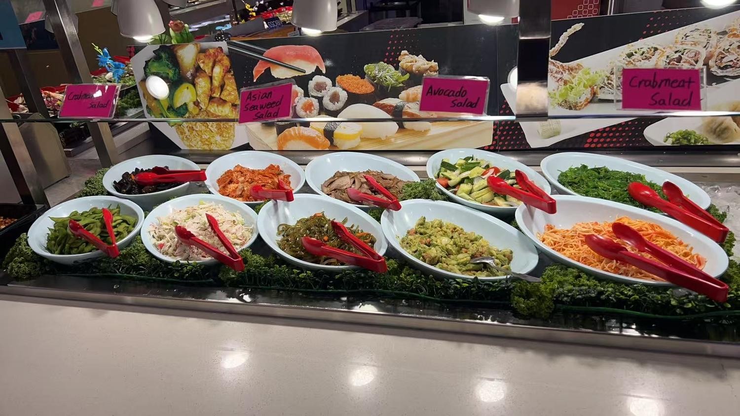 Bowls of seaweed, avocado and crab meat cold Asian salads at YC Seafood Hot Pot, a Hot Pot Restaurant in Virginia Beach