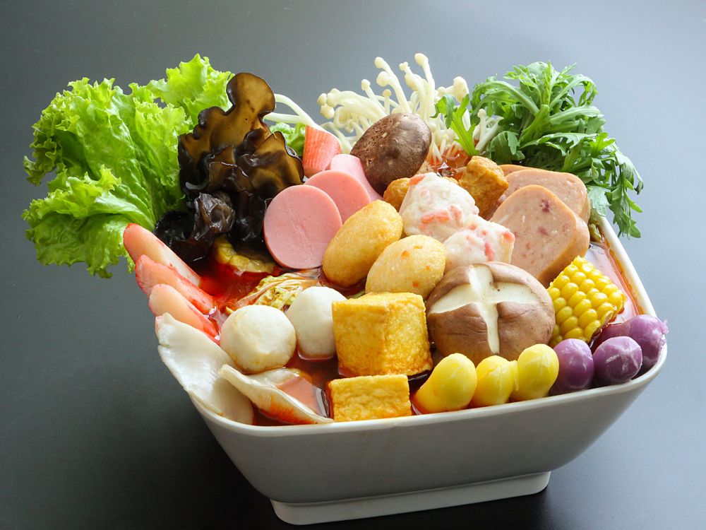 Assorted meatballs & veggies in spicy malatang at YinTang Spicy Hot Pot, a Hot Pot Restaurant in San Diego