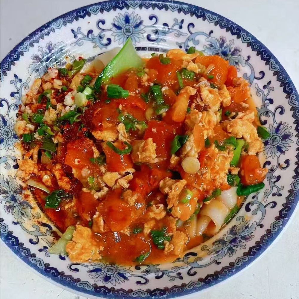 Oil-splashed tomato egg noodles from Yummy Noodle Kitchen, a Chinese restaurant in Artesia