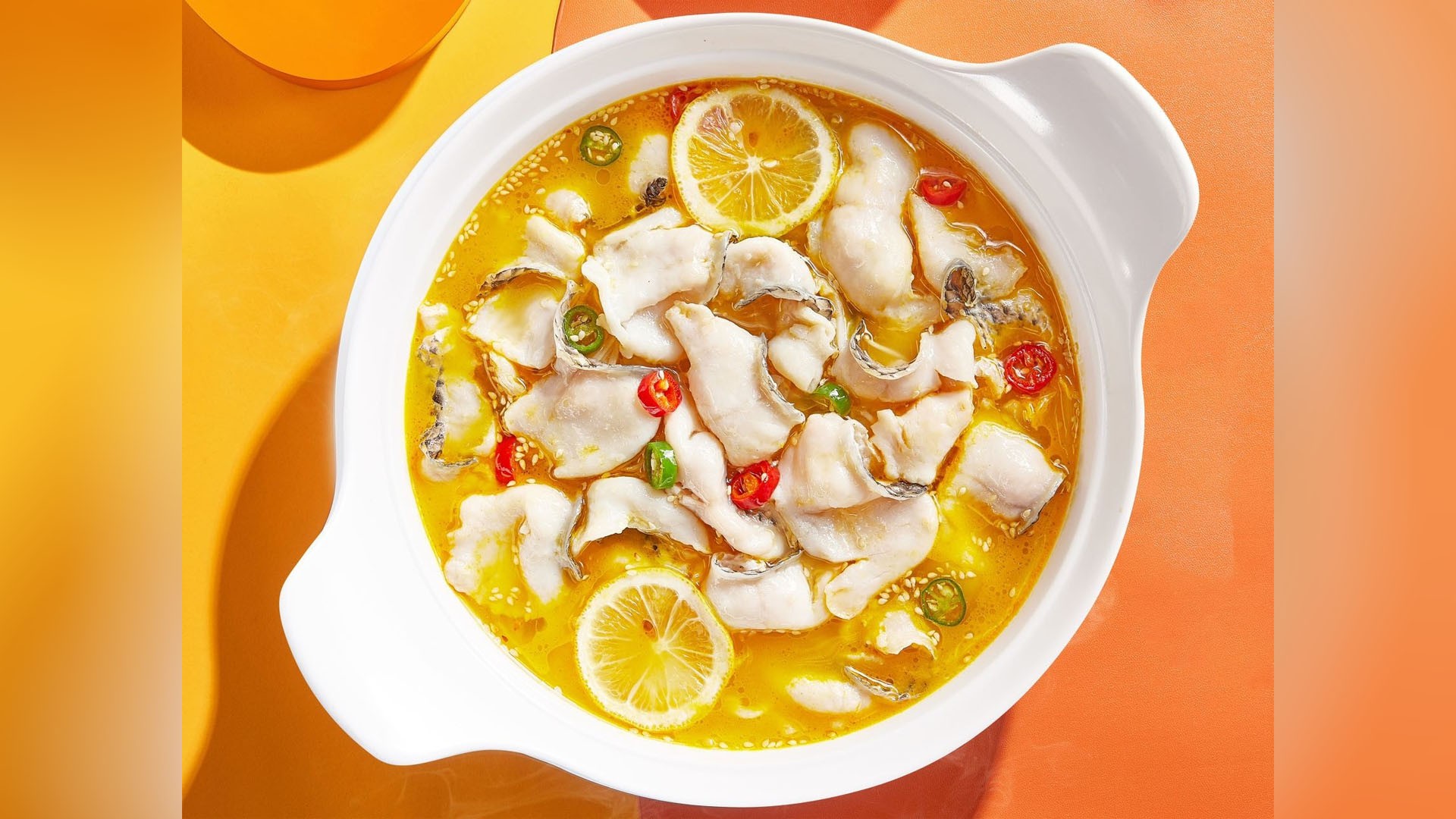 Lemon sour spicy fish slices in golden soup at YonnyFish With You, a Chinese Restaurant in Arcadia