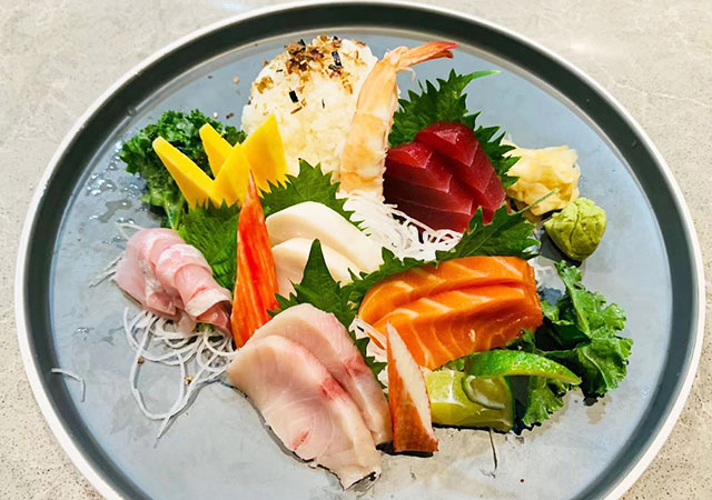 Assorted sashimi platter with rice and wasabi at Yosuki Sushi，a Japanese Restaurant in Staten Island