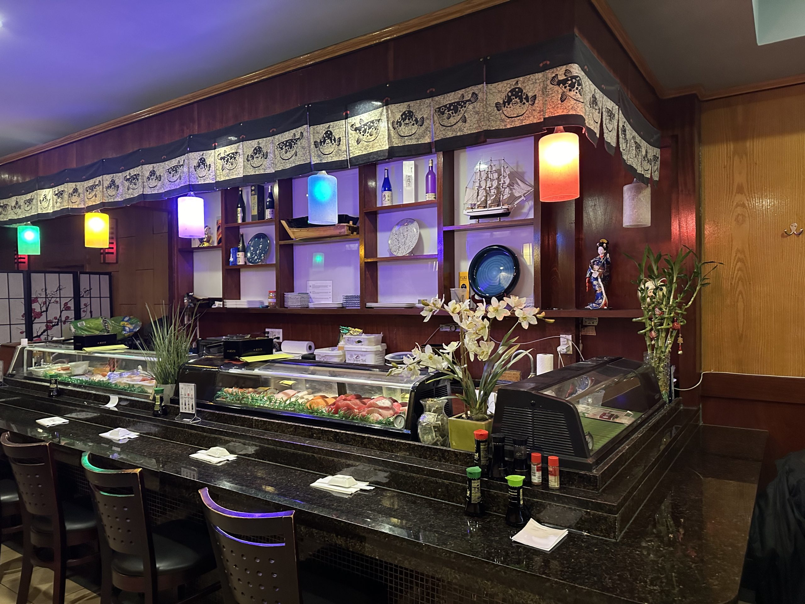 Sushi counter with Japanese decor at Yuki Japanese Restaurant, a Japanese Restaurant in New York