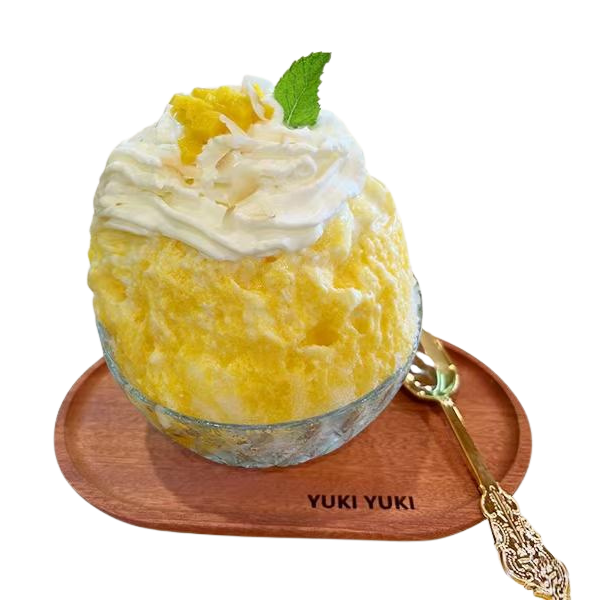 Sweet mango kakigori with cream and mint leaf at Yuki Yuki, a Bubble Tea Store in San Diego