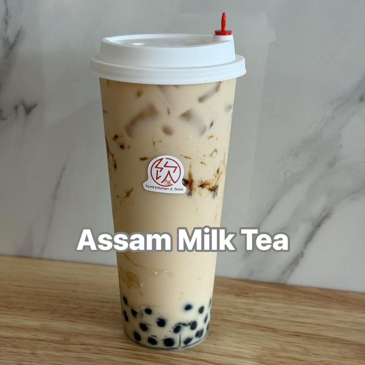 Yumi-Kitchen-&-Boba-Asian-Fusion-restaurant-Assam-Milk-Tea-DeLand Assam Milk Tea - Classic Assam milk tea with tapioca pearls at Yumi Kitchen & Boba, a Asian fusion restaurant in DeLand