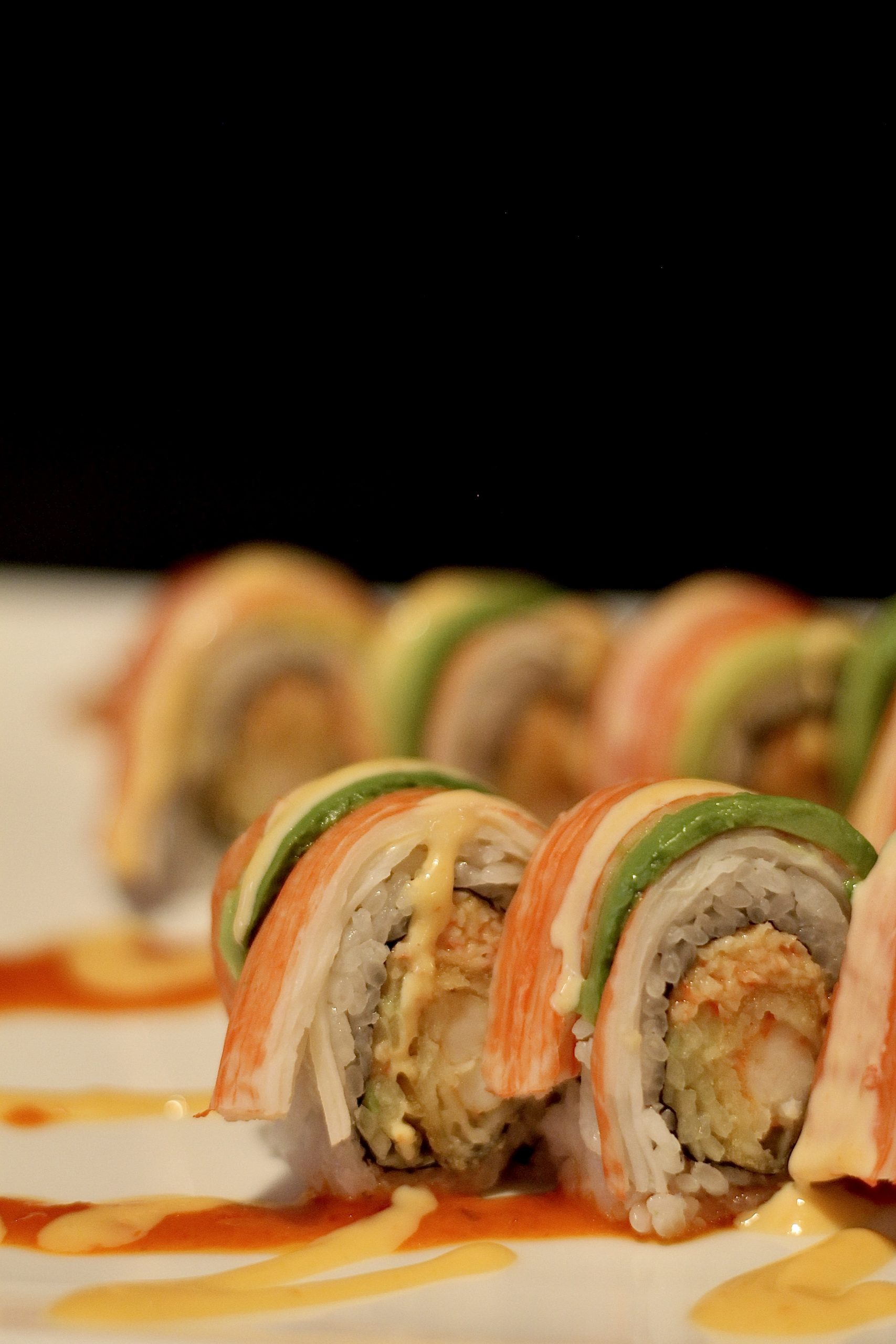 Crab and shrimp sushi roll with spicy sauce at Yummi Yummi Mongolian Grill & Sushi, a Asian Fusion Restaurant in College Station