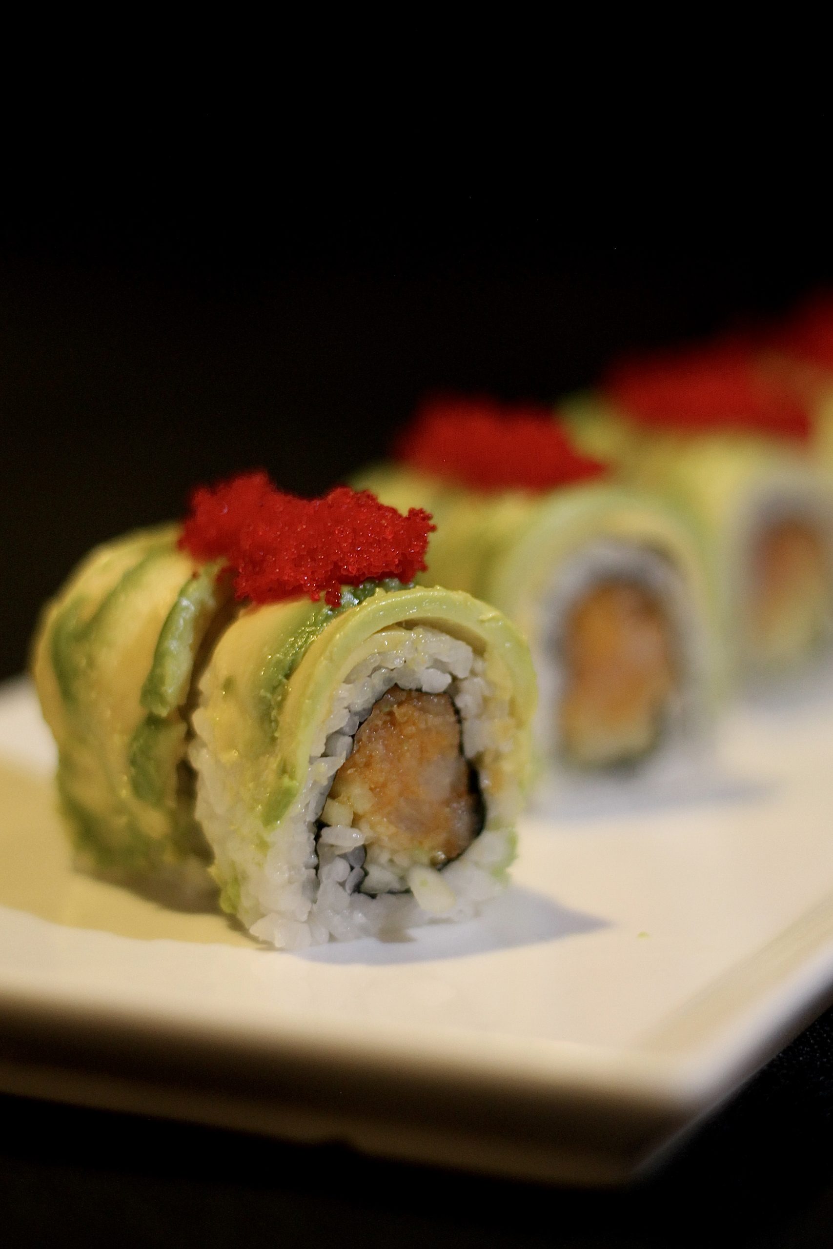 Avocado tempura sushi roll with tobiko at Yummi Yummi Mongolian Grill & Sushi, a Asian Fusion Restaurant in College Station