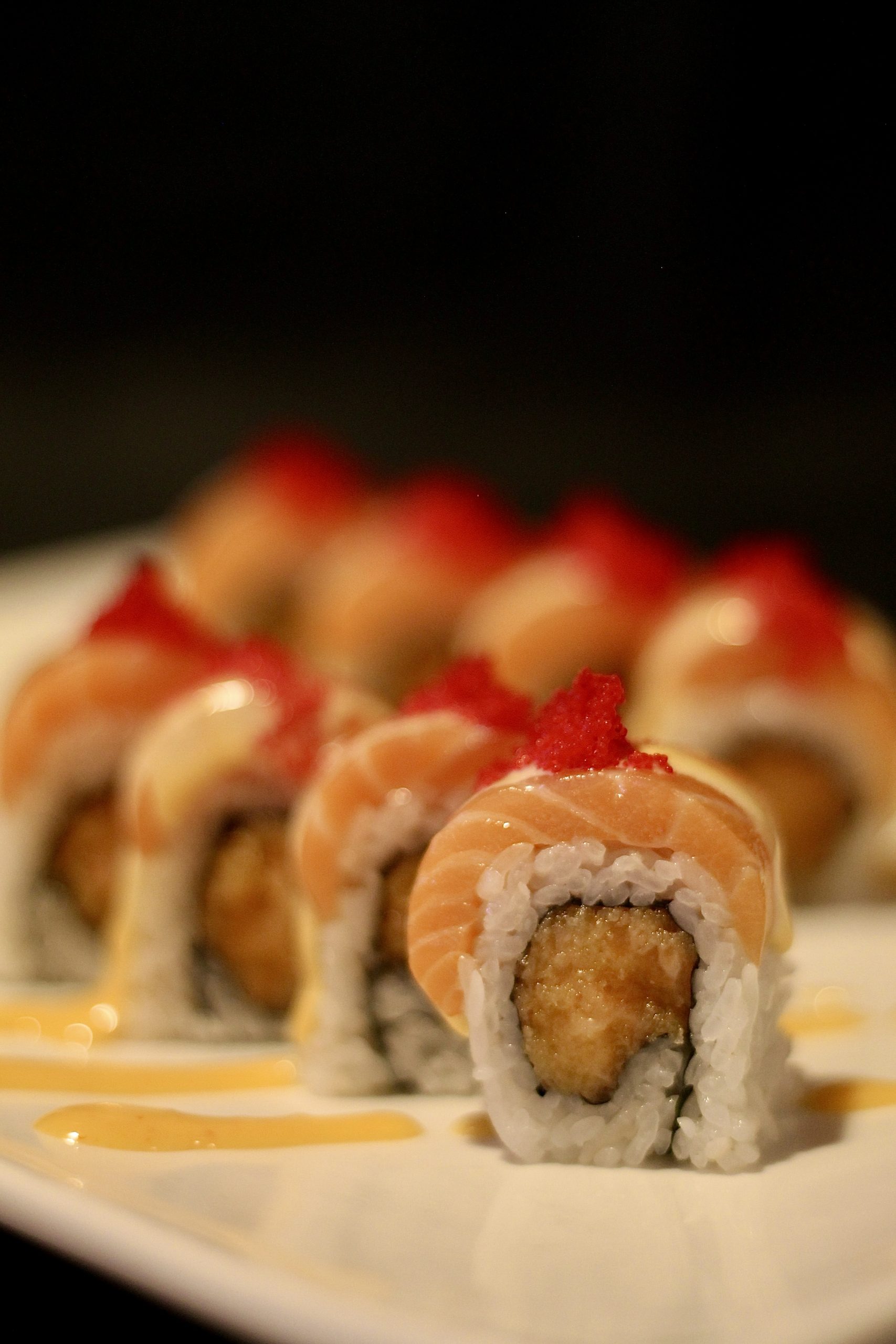 Salmon tempura sushi roll with tobiko at Yummi Yummi Mongolian Grill & Sushi, a Asian Fusion Restaurant in College Station