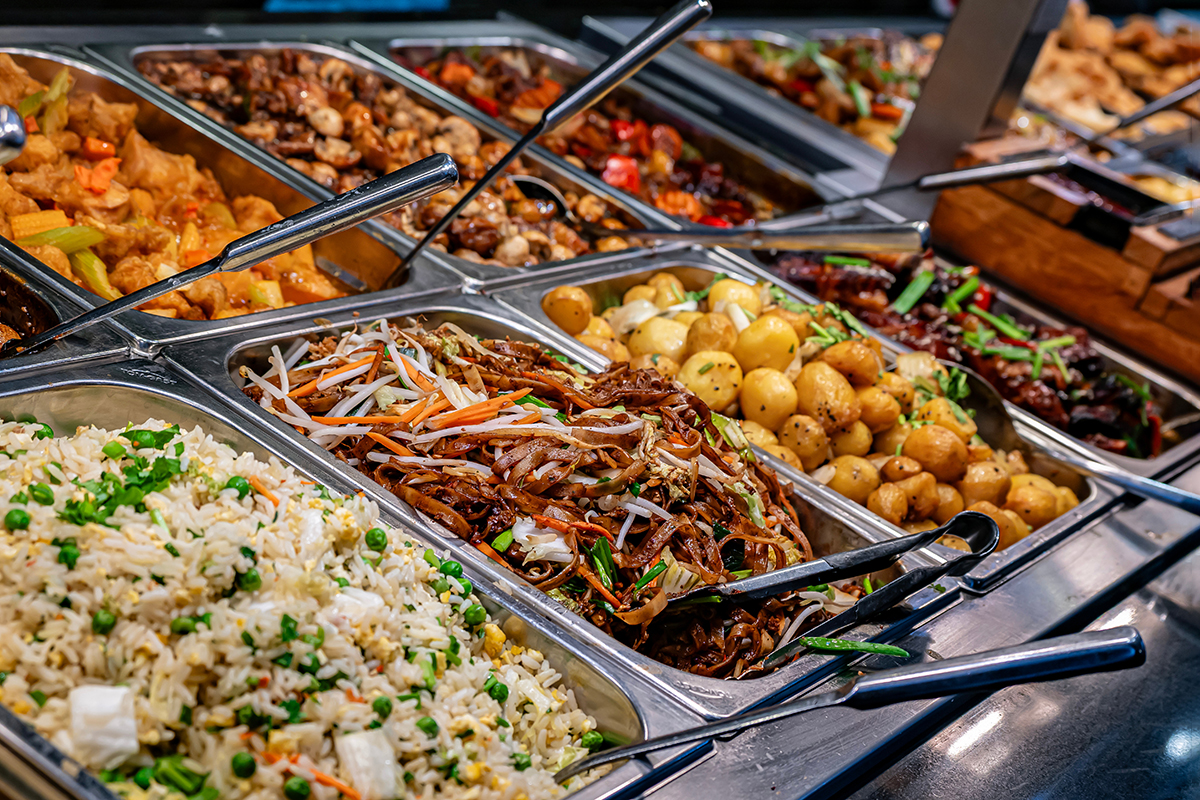 Assortment of fried rice lo mein and savory hot stir fry buffet trays at Yummy Buffet Asian Cuisine, an Asian Restaurant in Sikeston