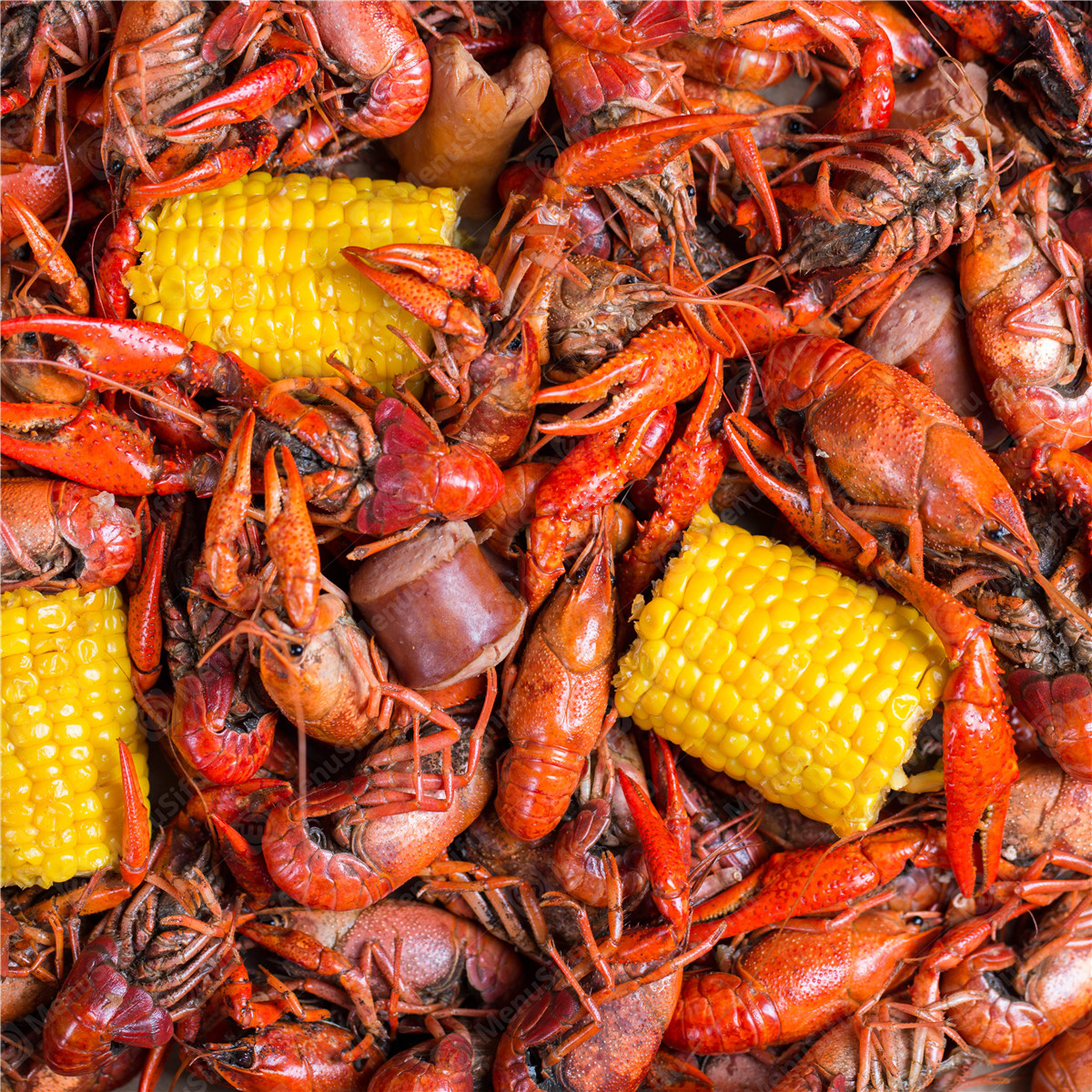 Crawfish Boil - Spicy crawfish boil with corn and sausages at Yummy Crab, a Seafood Restaurant in Houston