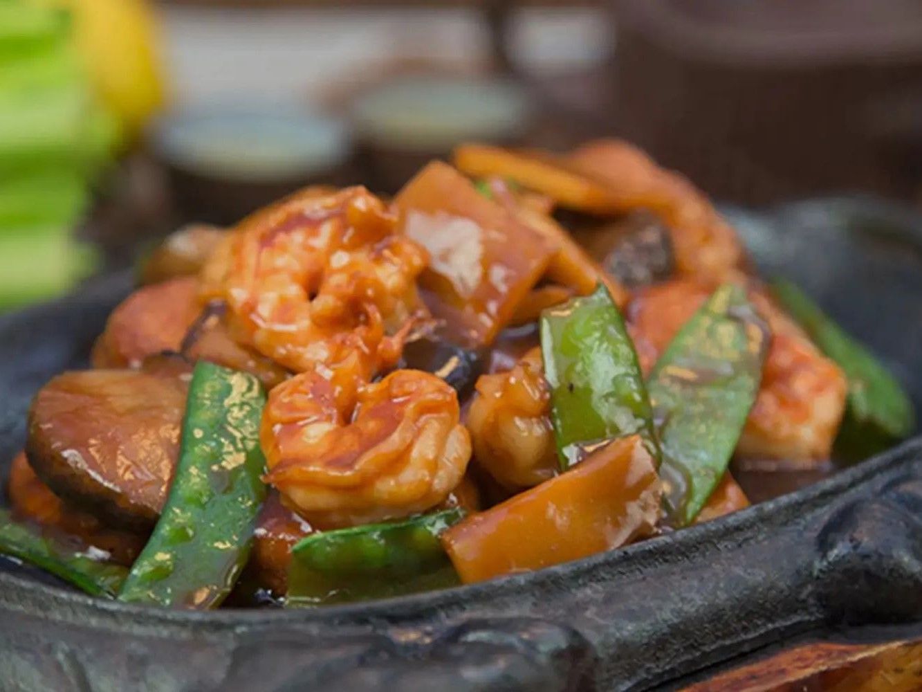 Sizzling shrimp stir-fry with snow peas, mushrooms and glossy sauce