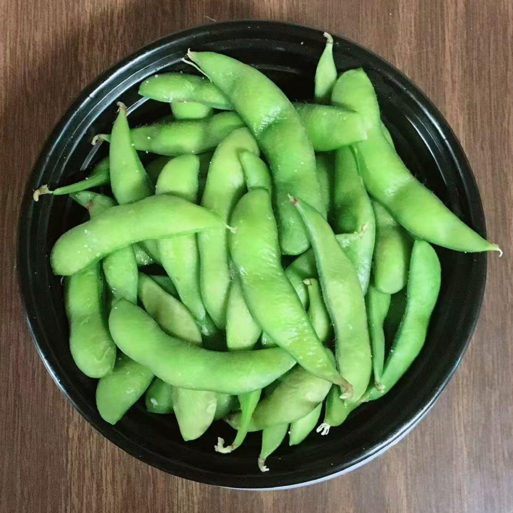 Fresh, vibrant green edamame pods at Yummy House, a Asian Restaurant in Athens.