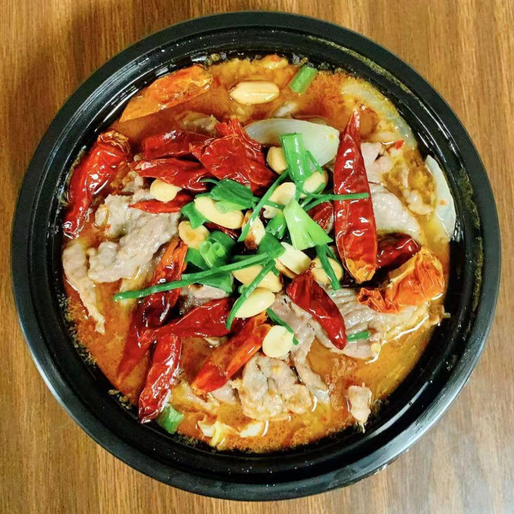 Spicy Szechuan beef in a flavorful hot pot at Yummy House, a Asian Restaurant in Athens.