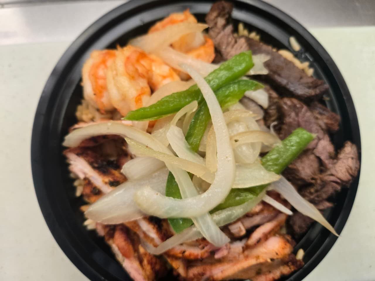 Mexican rice with chicken steak and shrimps at No.1 Yummy Taco, a Mexican Restaurant in South Ozone Park