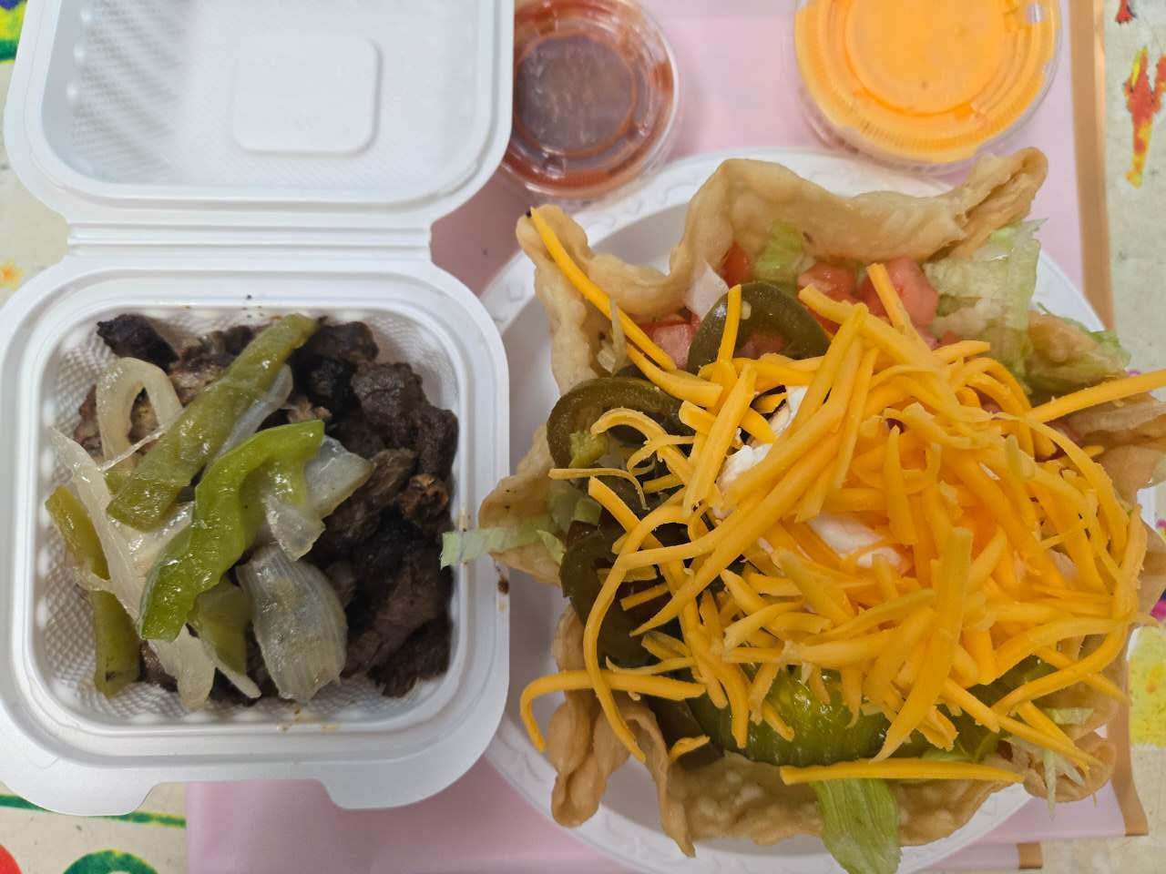 Steak tostada salad with cheese and jalapenos at No.1Yummy Taco, a Mexican Restaurant in South Ozone Park