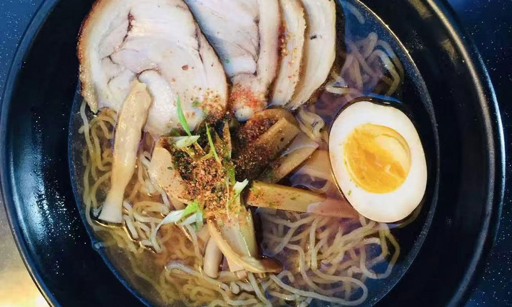 Shoyu ramen with chashu, soft-boiled egg, bamboo shoots, and scallions at Yu San, a Japanese Restaurant in East Stroudsburg