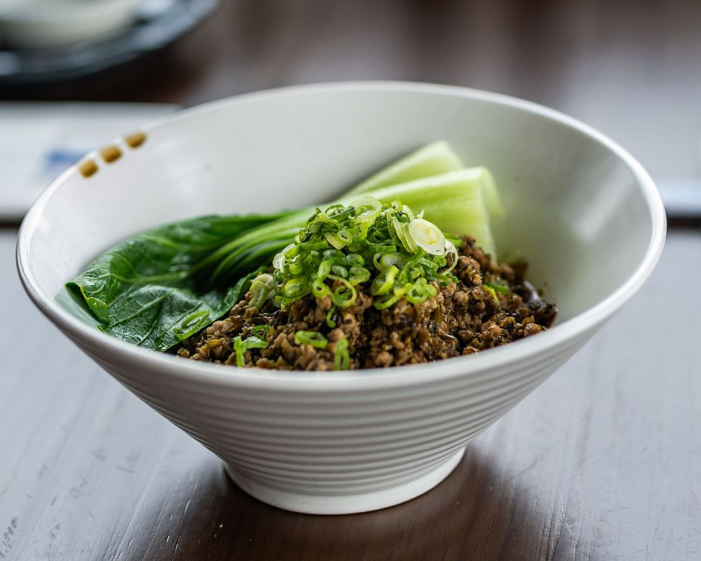 Minced meat with spinach and cucumber served at Yu's Noodle Shop, a Chinese restaurant in Lone Tree