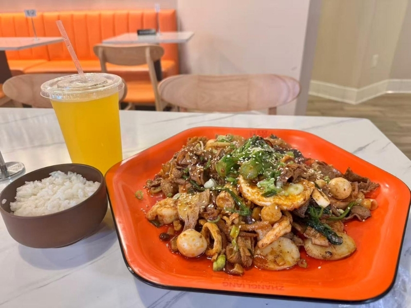 Spicy stir-fry with rice & drink at Zhangliang Malatang Spicy Hotpot, a Hot Pot Restaurant in National City